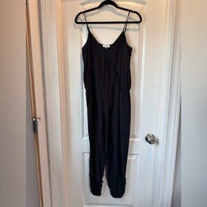 Parker Black Silk Jumpsuit Sleek Minimalist Design Size M with jogger bottoms